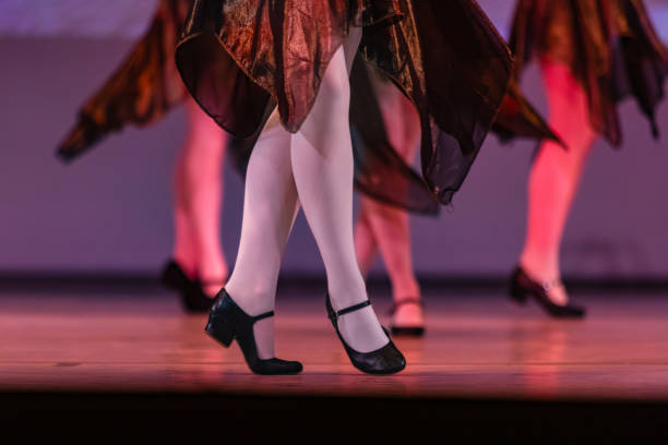 istock Closeup of ballerinas dancing on stage. 2156890004