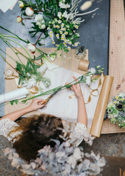 istock Woman making a flower bouquet 2156890922