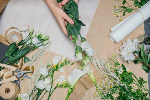 istock Woman making a flower bouquet 2156890943