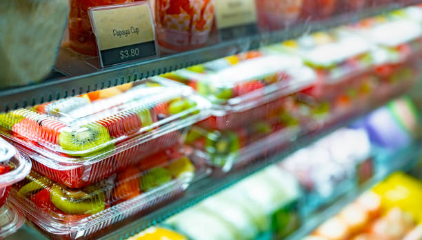 istock Plastic boxes with fresh fruits in a commercial refrigerator 2156891387