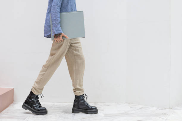 Casual woman carrying a portfolio