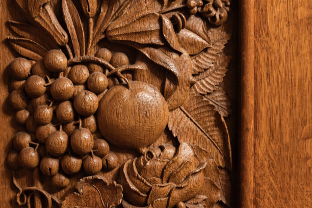 Decorative carving pattern of vintage wooden cabinet panel, close up