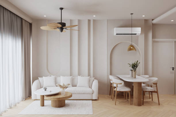 istock This modern living room, awash with natural light, features a plush white sofa and minimalist decor 2156896891