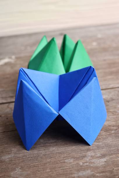 istock Origami paper fortune teller on wood background 2156897269