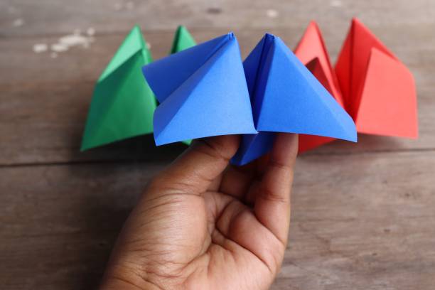 istock Origami paper fortune teller on wood background 2156897280