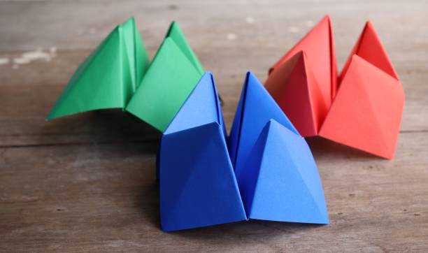 istock Origami paper fortune teller on wood background 2156897283