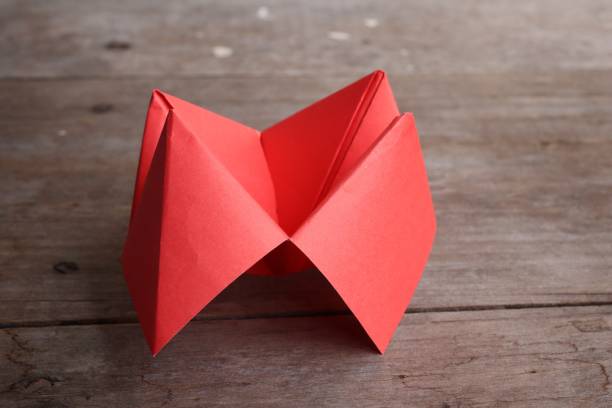 istock Origami paper fortune teller on wood background 2156897292
