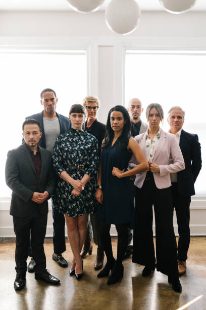 istock Confident empowering business people standing together 2156898783