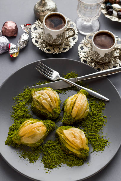 istock Turkish mussel shaped pastry baklava with coffee 2156898838