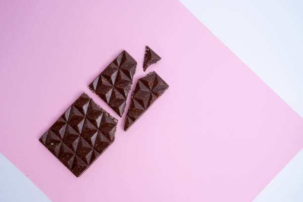 istock Chocolate bar, top view on color background with copy space. Sweets and chocolate concept 2156898993