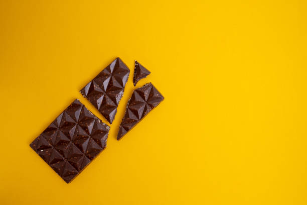 istock Chocolate bar, top view on color background with copy space. Sweets and chocolate concept 2156899003