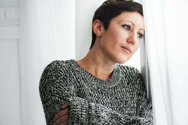 istock Woman hugging herself in winter 2156899031