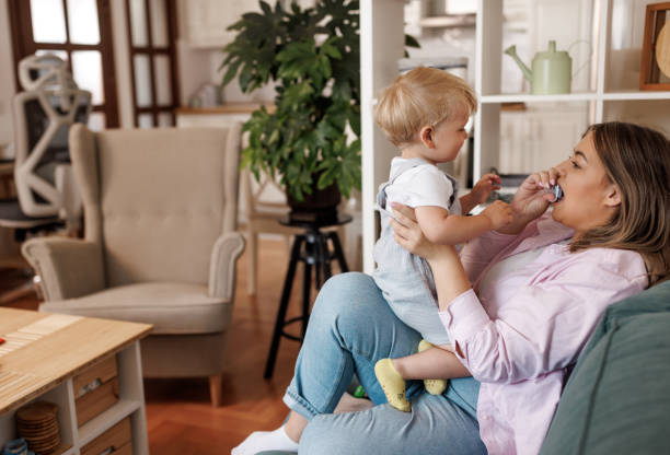 istock Taking a break to play with her little boy 2156901561