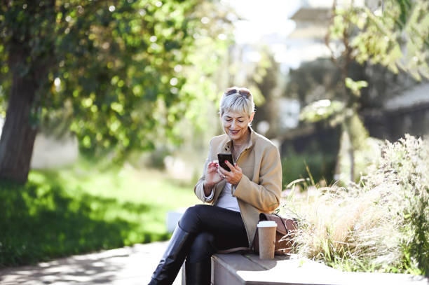 istock Smiling business woman having coffee break. 2156901666