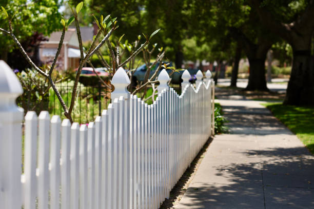 Old fashioned picket fence with a scalloped edge