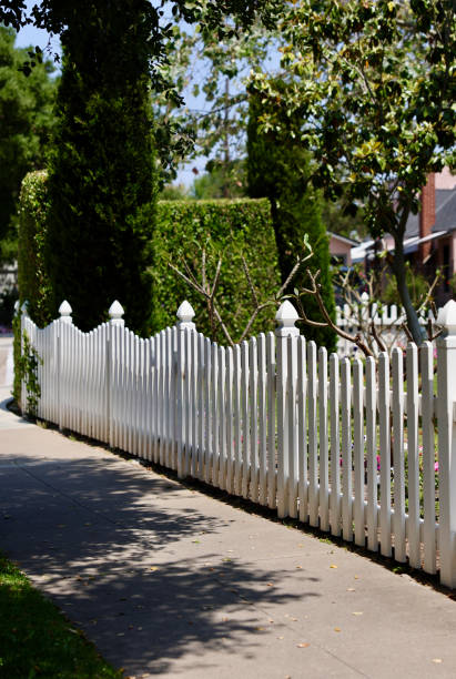 istock Old fashioned picket fence with a scalloped edge 2156902255