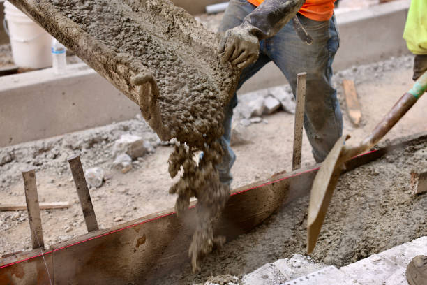istock Road crew pouring fresh concrete 2156903528