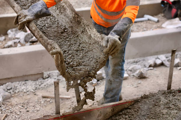 istock Road crew pouring fresh concrete 2156903540