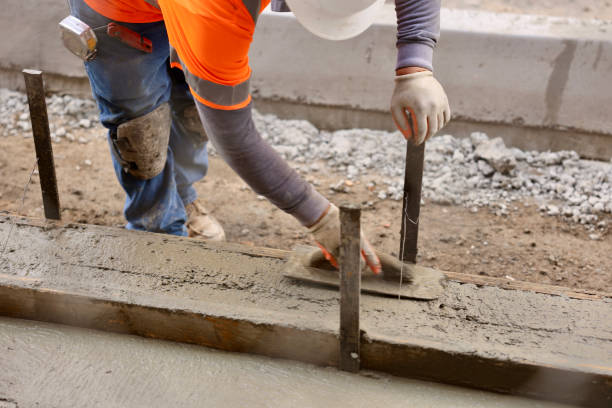 istock Road crew pouring fresh concrete 2156903548