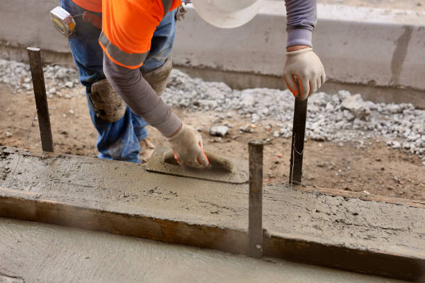 istock Road crew pouring fresh concrete 2156903549