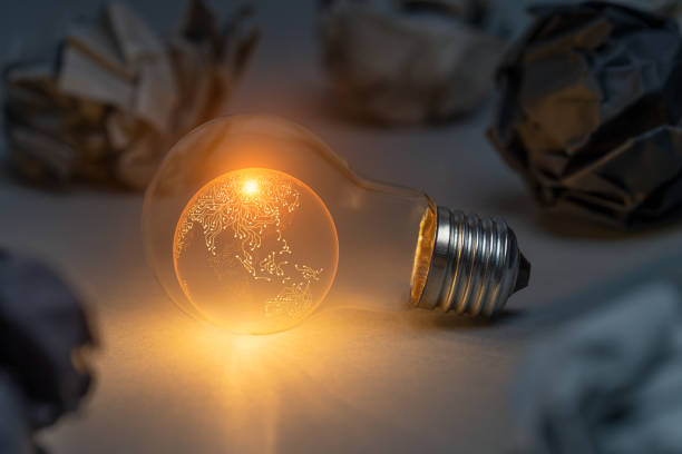 istock Artificial intelligence earth concept with classic light bulb glowing in the dark 2156909680