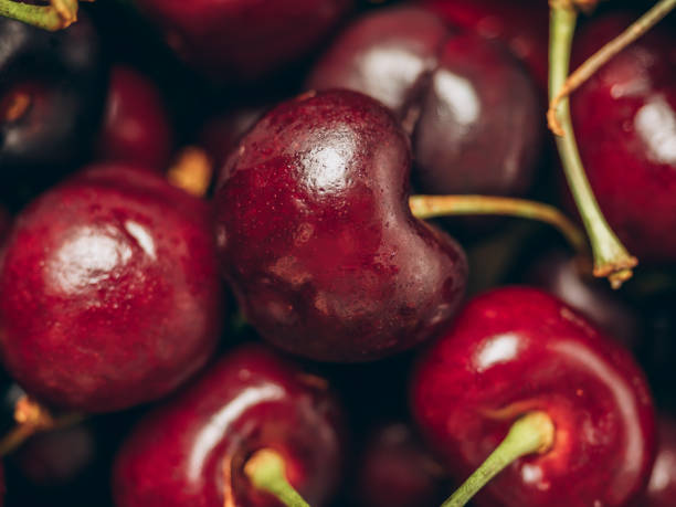 istock Fresh ripe sweet cherry background closeup 2156911046