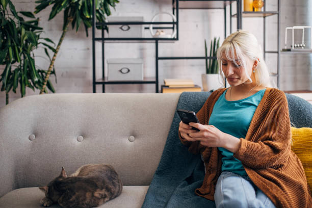 istock Young white girl using a smart phone 2156917439