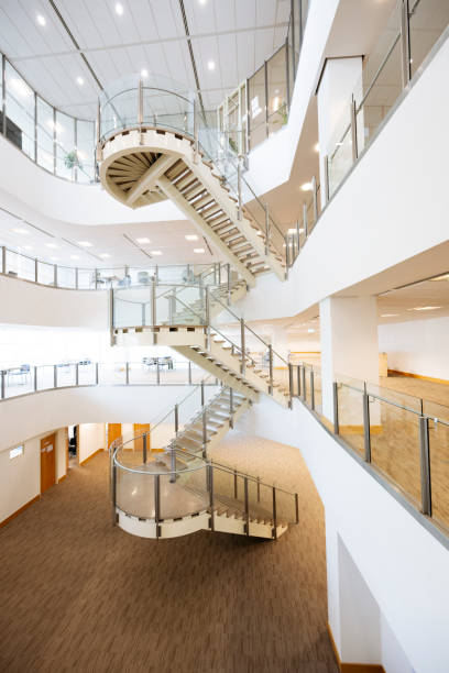 istock Staircase over several floors of in bright modern atrium 2156919478