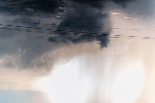 istock Stormy sky. Thunderstorm clouds with the discharges of lightning at evening 2156922098
