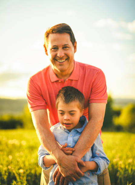 istock Nice father and child Playing on great field at Sunset 2156922258