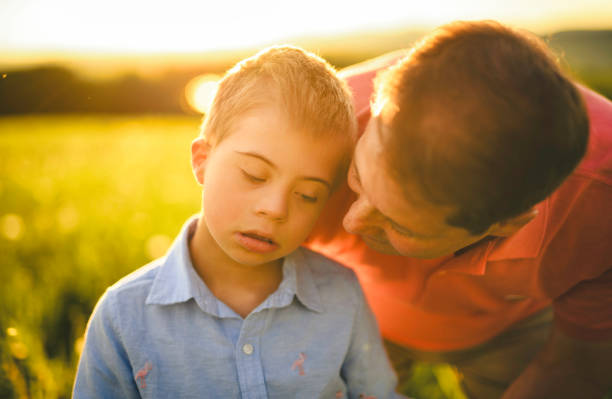 Father and son looking eye to eye angerily 