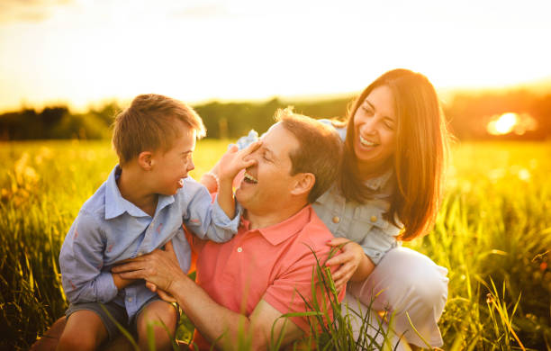 istock Nice family Playing on great field at Sunset 2156923687