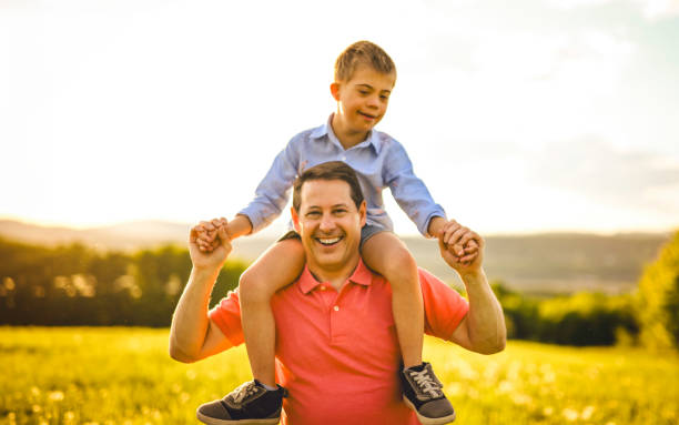 istock Nice father and child Playing on great field at Sunset 2156923695