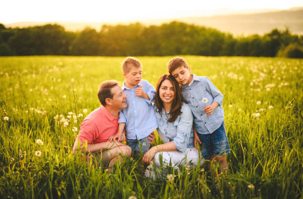 istock Nice family Playing on great field at Sunset 2156923726