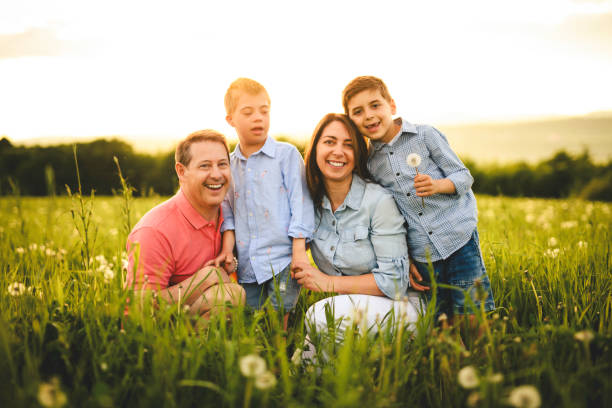 istock Nice family Playing on great field at Sunset 2156923733