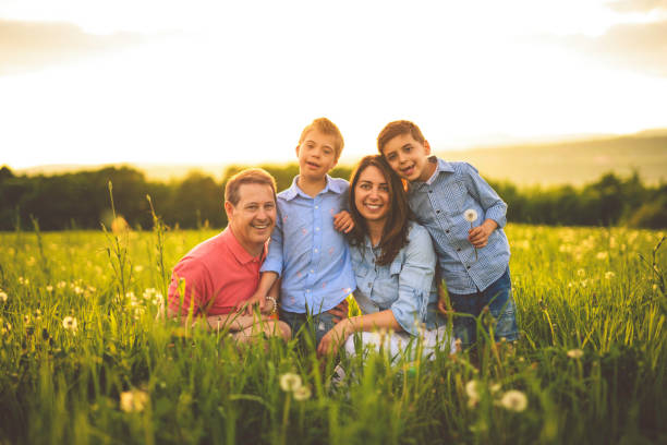 istock Nice family Playing on great field at Sunset 2156923737