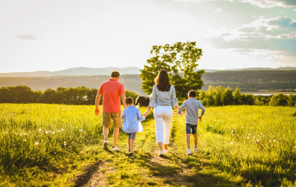 istock Nice family Playing on great field at Sunset 2156923786