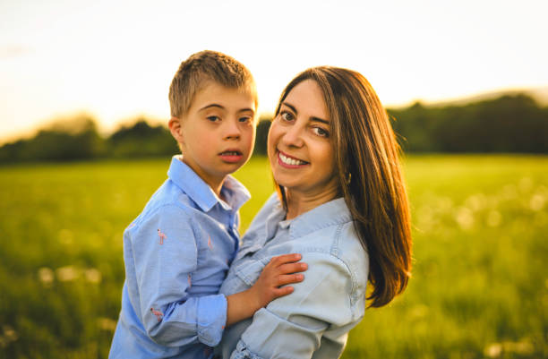 istock Nice mother and child Playing on great field at Sunset 2156923789
