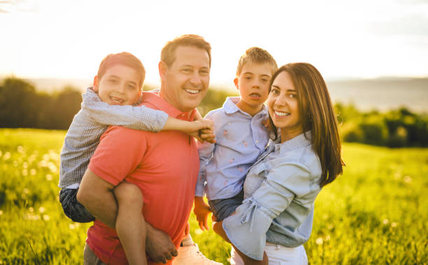 istock Nice family Playing on great field at Sunset 2156923791
