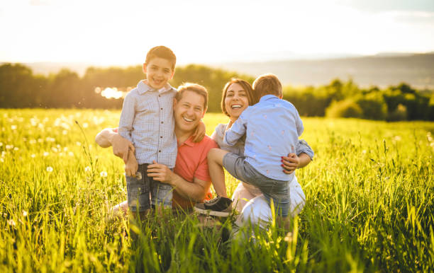 istock Nice family Playing on great field at Sunset 2156923804