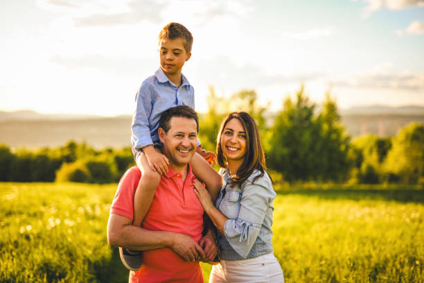 istock Nice family Playing on great field at Sunset 2156923887