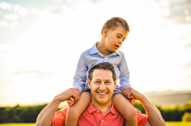 istock Nice father and child Playing on great field at Sunset 2156923894