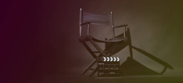 istock Black director chair and Clapper board or slate on black background. 2156925807