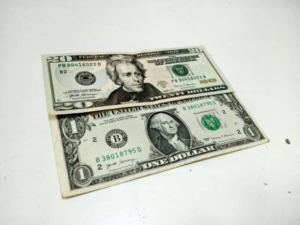 istock One Dollar And Twenty Dollar Bills | Banknote | Finance 2156926096