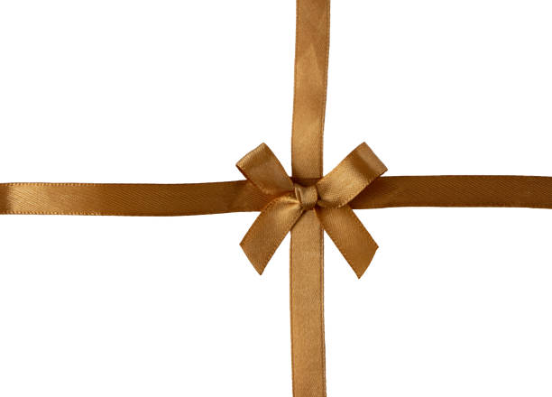 istock Golden textile ribbon bow isolated on white 2156926563
