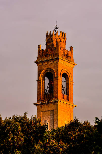 istock A tall brick tower with a weather vane on top 2156930679