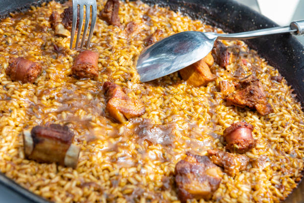 Serving a Paella in Spain - Meat paella, Mountain type