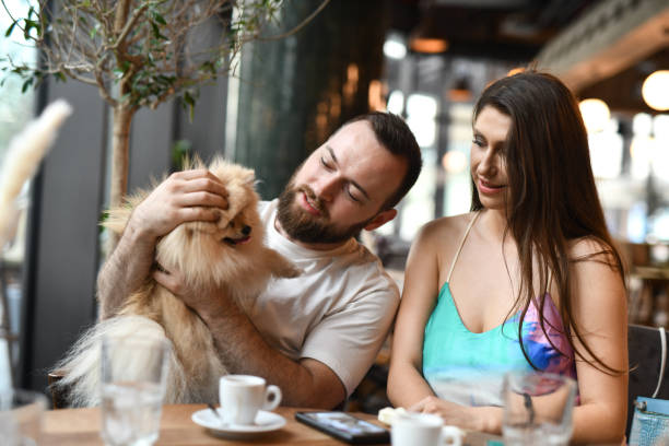 istock Fun Times With Pet Pomeranian For Cute Couple 2156934219