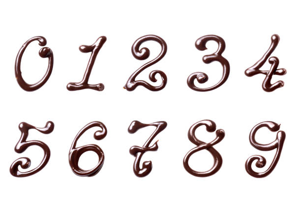 Hand drawn numbers with melted chocolate close up, isolated on a white background