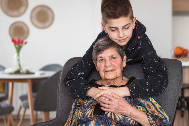 istock Boy hugging grandmother 2156935234